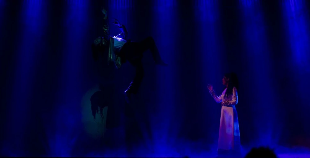 TrackingPro programmed around 300 auto-function points, allowing performers to enter, disappear into set elements, and re-emerge anywhere in the space, with automatic fades applied