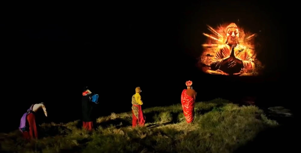 Vivid Buddha image projected onto cliff-face with a Christie Griffyn 4K50-RGB projector