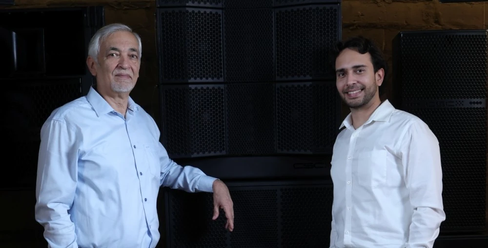 Lalit Chopra and Aamer Chopra with the Harmonica 210 line array