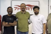 Representatives from APEX and 7Hertz celebrate their new partnership